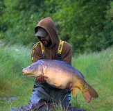 Vass Strapped Hoodie and 220 Waterproof Bib and Brace Fishing Man with Carp Fish