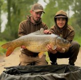 Two Fishermen wearing Vass casualwear hoodies joggers and caps